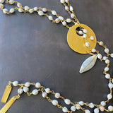 GRAY SEEDS CHARM NECKLACE